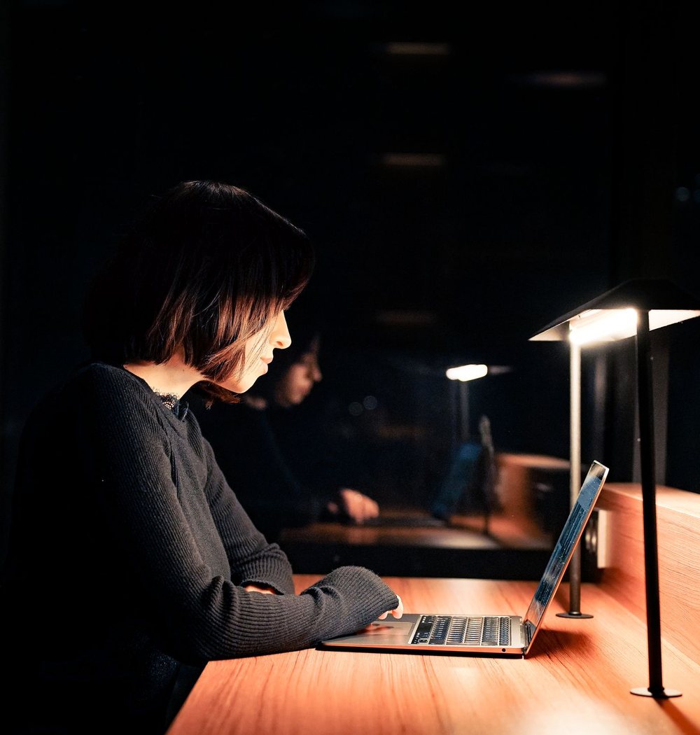 Professional working at a computer in an office